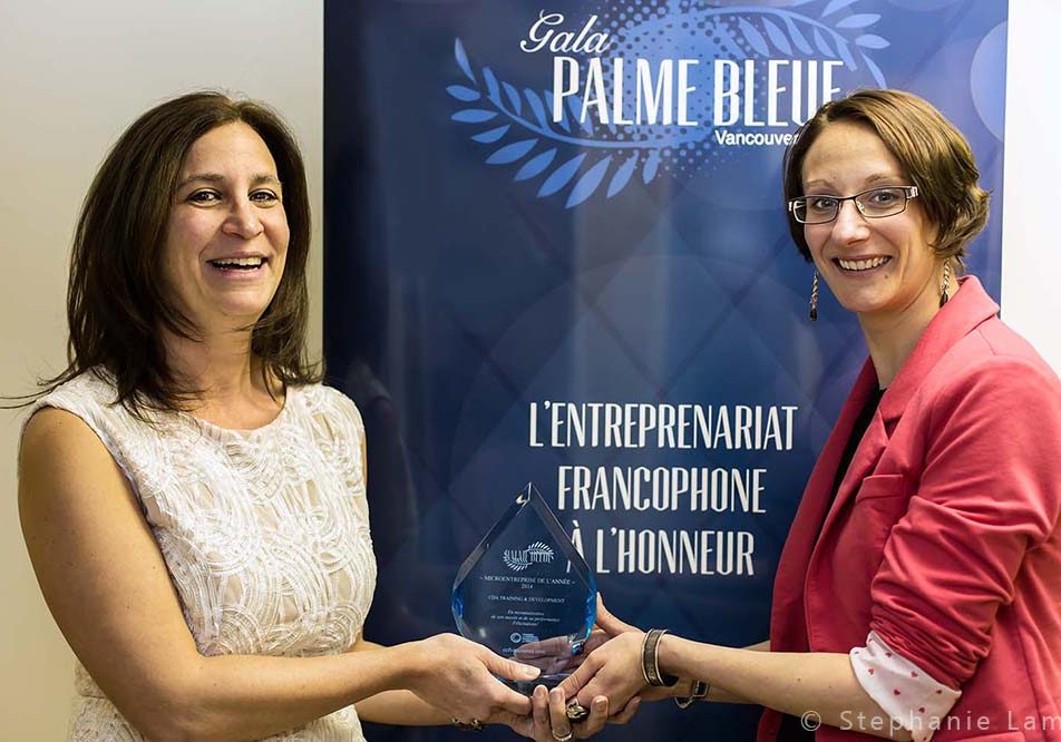 CDA Founder Carla Abichahine accepting the Palme Bleue award for “Micro Enterprise of the Year” from the Vancouver Francophone Chamber of Commerce in October 2014.